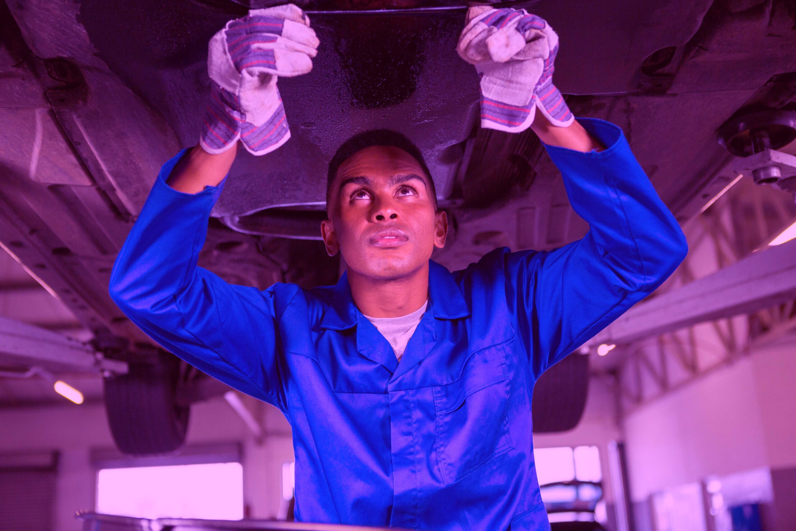 Mechanic servicing a car